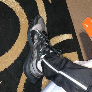 Black and Grey Nike Zoom Gravity